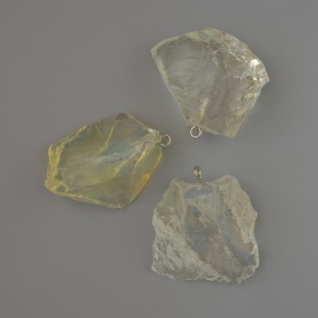 Висулка от необработен лунен камък — диаметър 38х19 до 38х31 мм +/- асортимент