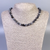Намисто от снежен обсидиан «Сълзи Апачи» грановани мънисти, диаметър около 8 мм, дължина около 50 см, с карабинка