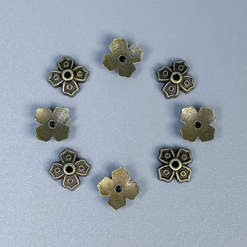 Фурнитура капачета за мъниста, бронзов цвят, диаметър 7х1 мм ± отвора, диаметър на отвора около 1 мм ± опаковка 50 бр