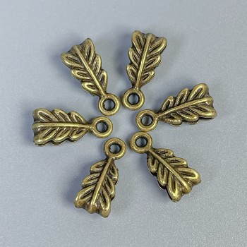 Фурнитура бейл бронзов цвят, размери 14×7×5 мм ±, отвори диаметър около 2,5 мм и около 1,8 мм ±, опаковка 22 бр