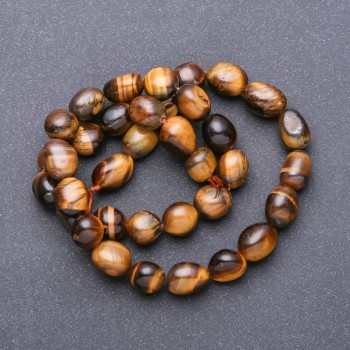Мъниста на конец от естествен камък тигрово око галтовирани, диаметър 9–12×8 мм + -, дължина 38 см