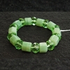 Еластична гривна от пресован нефрит и чешко стъкло