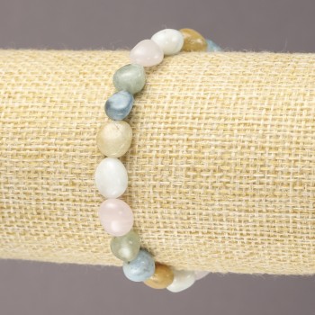Гривна на ластик от естествен камък морганит, галтовирани мъниста, диаметър 7×9 мм (±)