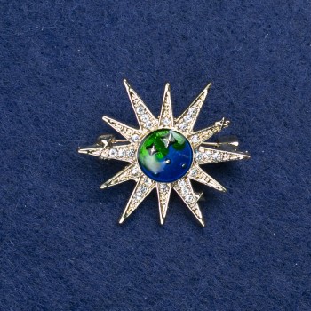 Брошка «Звезда» от златист метал и стрази 32 мм +