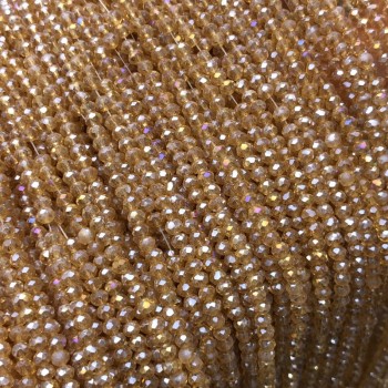 Мъниста чешки кристал на конец – оранжево-персиков прозрачен с бензинов блясък, гранован рондел, диаметър 3×2,5 мм, дължина 36 см +