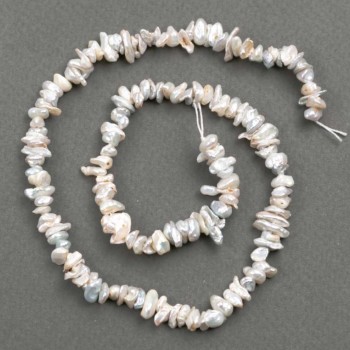 Нишка барокови перли късчета с оттенък «бензин», диаметър 6х1–3 мм, дължина 39 см+