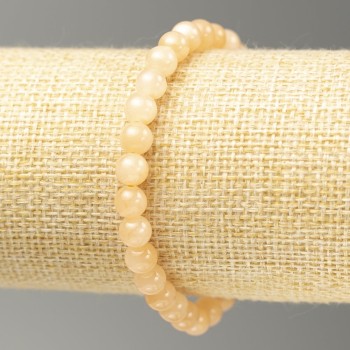 Гривна на ластик със селенит (изкуствен акрил) – гладко топче, диаметър 6,5 мм, дължина 18 см