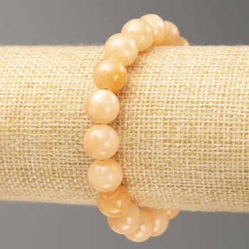 Гривна на ластик със селенит (изкуствен акрил) гладка мъниста, диаметър около 10 мм ±, дължина 18 см ±