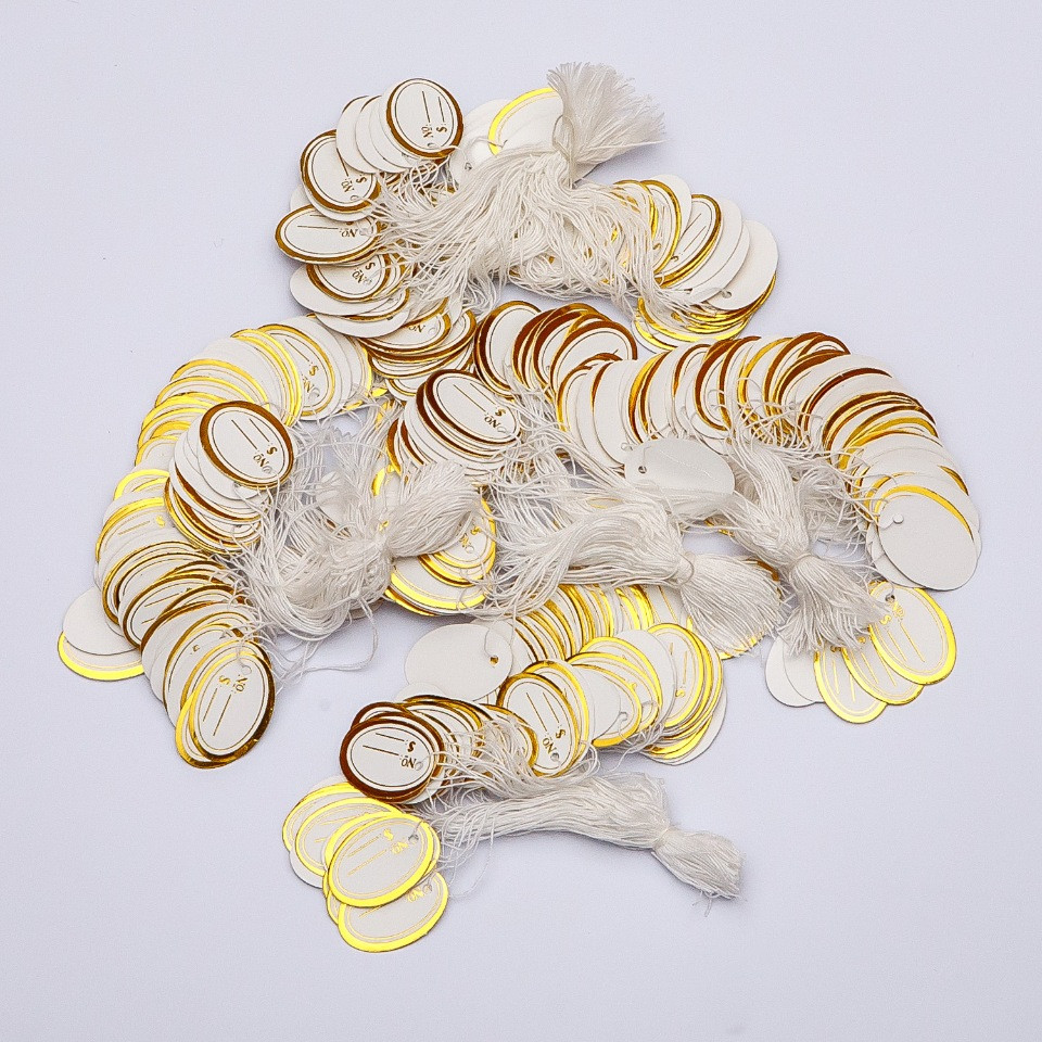 Ценник на нишка 26×17 мм ± 100 бр