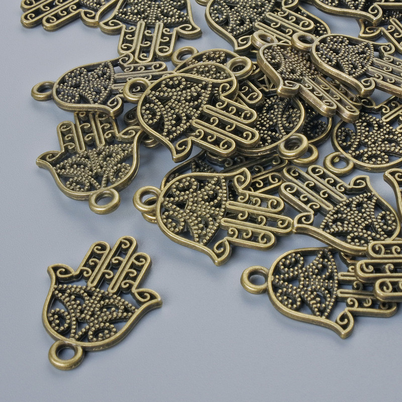 Висулка-фурнитура „Хамса“, диаметър 21×15 мм, диаметър на отвора 1,7 мм, фас. 24 бр ±, бронзов цвят на метал