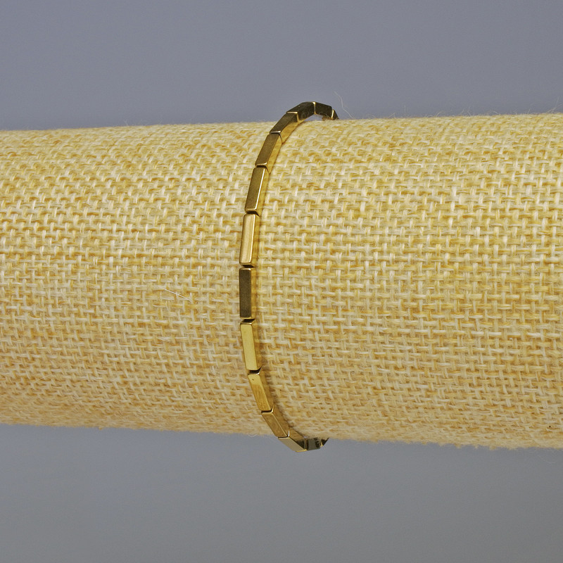 Браслет гематит правоъгълен, златист цвят, диаметър 7×2 мм, дължина 18 см – еластична основа