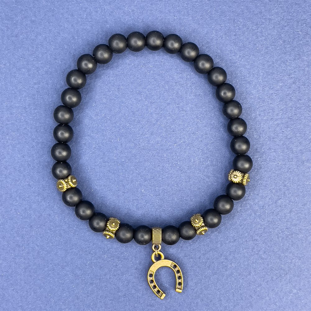 Гривна от шунгит, диаметър около 6 мм ± с метални вложки, дължина около 18 см ± еластична