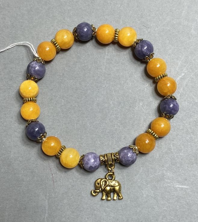 Гривна от акрилни гладки топчета 8 мм +- с метални вложки, дължина 18 см+- еластична основа