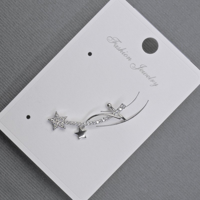 Обeца пусета с кафяв оттенък на златист метал 11×28 мм ± бели стрази