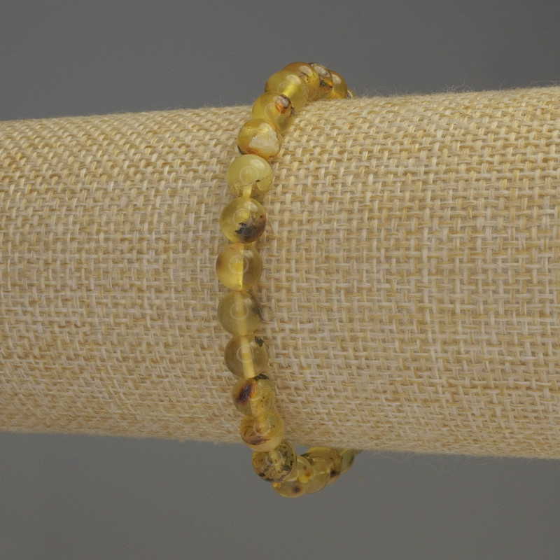Браслет от янтар, гладка мъниста, диаметър 6–6,5 мм, дължина 18 см, стреч