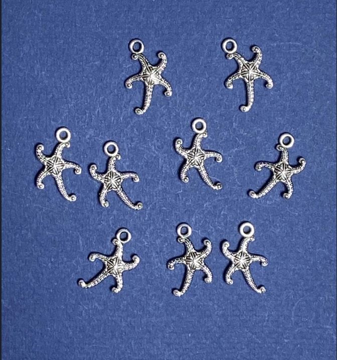 Фурнитура: висулка Морска звезда 12×19 мм ± опаковане 20 грама ± 22 бр.