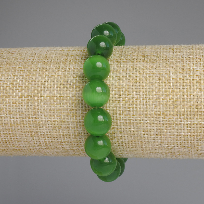 Браслет котешко око с гладка бусина, диаметър около 9,5 мм, дължина 18 см, еластична основа