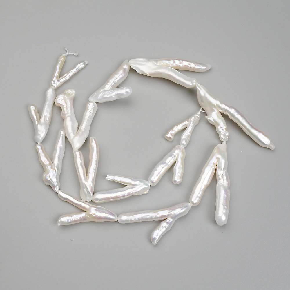 Барокови мънисти с бензинов оттенък 21-33х15-17мм +-, дължина около 37 см+