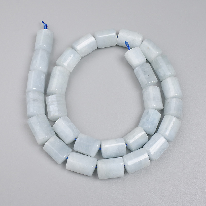 Аквамарин мъниста, триъгълна фасета, размер около 10–16×10 мм, на нишка, дължина 39 см+