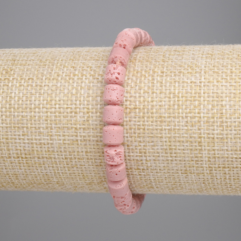 Браслет от розова вулканична лава — цилиндрични мъниста, диаметър около 6×6 мм ±, дължина около 18 см ±, на еластична нишка