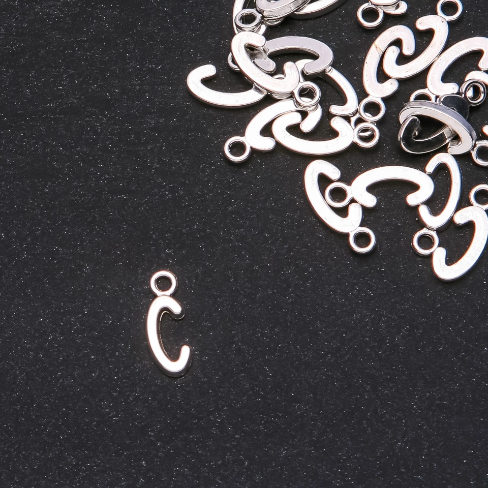 Фурнитура висулка Буква „C“ 17×7 мм фасовка 20 г (± 30 бр.)