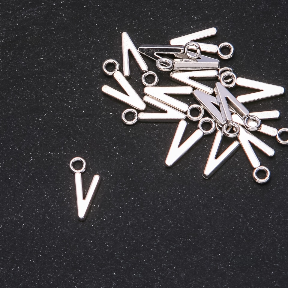 Фурнитура висулка буква «V» 17×7 мм фасовка 20 грама (+ - 30 бр.)