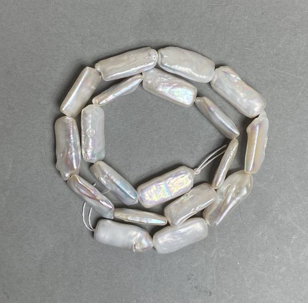 Барокови перли на конец със бензинов отлив, топъл оттенък, диаметър 10×21 мм, дължина 41 см (±)