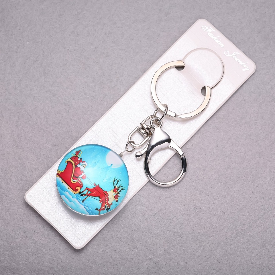 Ключодържател Нова година Дядо Коледа на елени, дължина 10 см