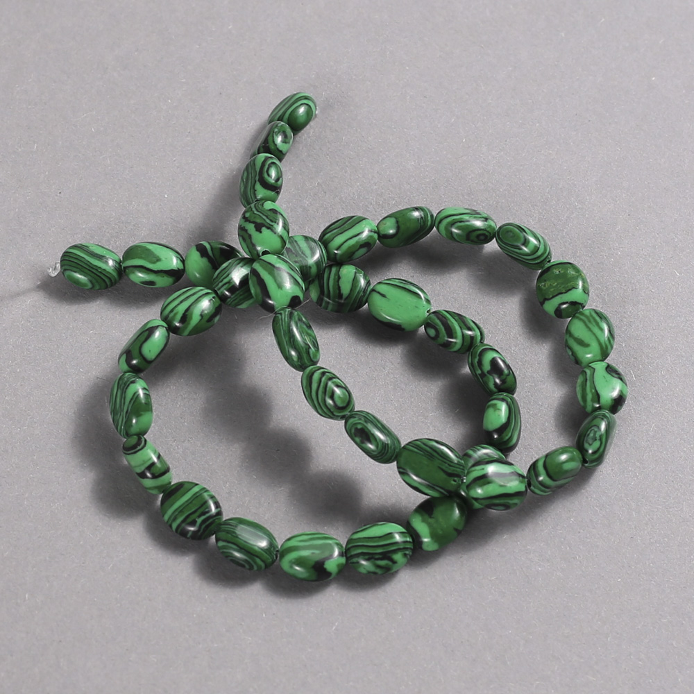 Намистини на конец от малахит (пресиран). Гладка овална форма, диаметър 10×8 мм + -, дължина 39 см +