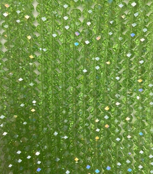 Намистини чешки кристал на конец светло зелени прозрачни с бензиново напыление, грановани рондели, диаметър 8х6,5 мм + -, дължина 40-4