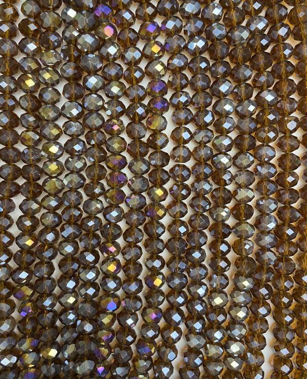 Намистини Чешки кристал на конец кафяви прозрачно с бензиново покритие грановани рондели, диаметър 8×6 мм + -, дължина 38 см +