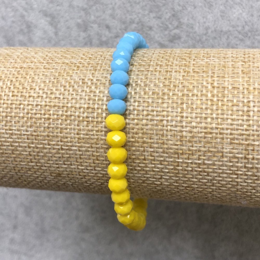 Гривна на еластична лента от чешки кристал „Украйна“, грановани рондели, диаметър 6×4 мм, дължина около 18 см