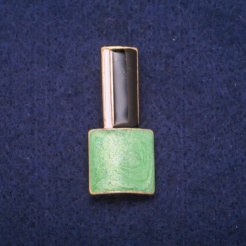 Брошка Лак зелена, черна и бяла емал, златист метал 18×39 мм