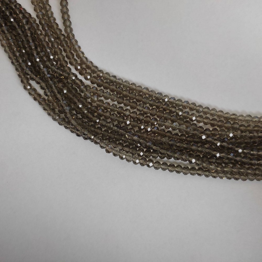 Намистини Чешки кристал прозрачен шампан «рондел», диаметър 6×4 мм на конец, дължина 43 см +