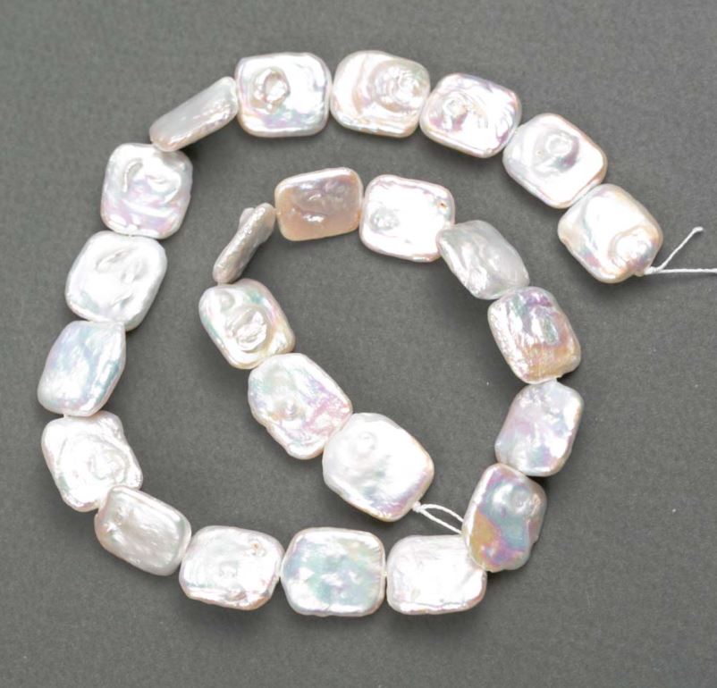 Барокови перли с оттенък «бензин» Ø 15–17×13–16 мм, дължина 38 см+-