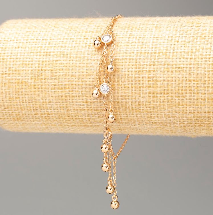 Гривна Xuping позлатена с 18K, дължина 18–20 см, дебелина около 1,5 мм, с топчета диаметър 4 мм, бели кристали