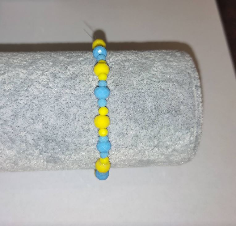 Браслет «Украйна» от чешки кристал «гранован рондель» на еластична основа, диаметър 6×4 мм ±, диаметър 3×2 мм ±, дължина 18 см+