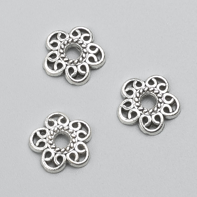 Фурнитура: накрайник, метален цвят - сребърен, диаметър 12×2 мм (±), фасовка -20 г, 52 бр. (±)