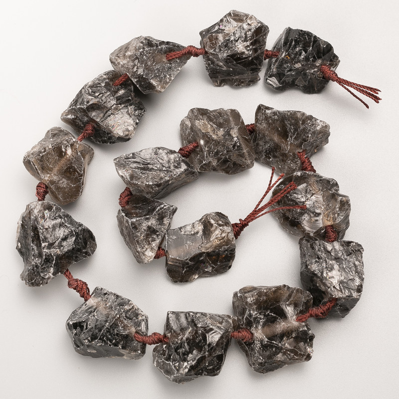 Намистини Раухтопаз необроблений натуральний камінь галтування на нитці d 25х27мм+-, довжина 42см +