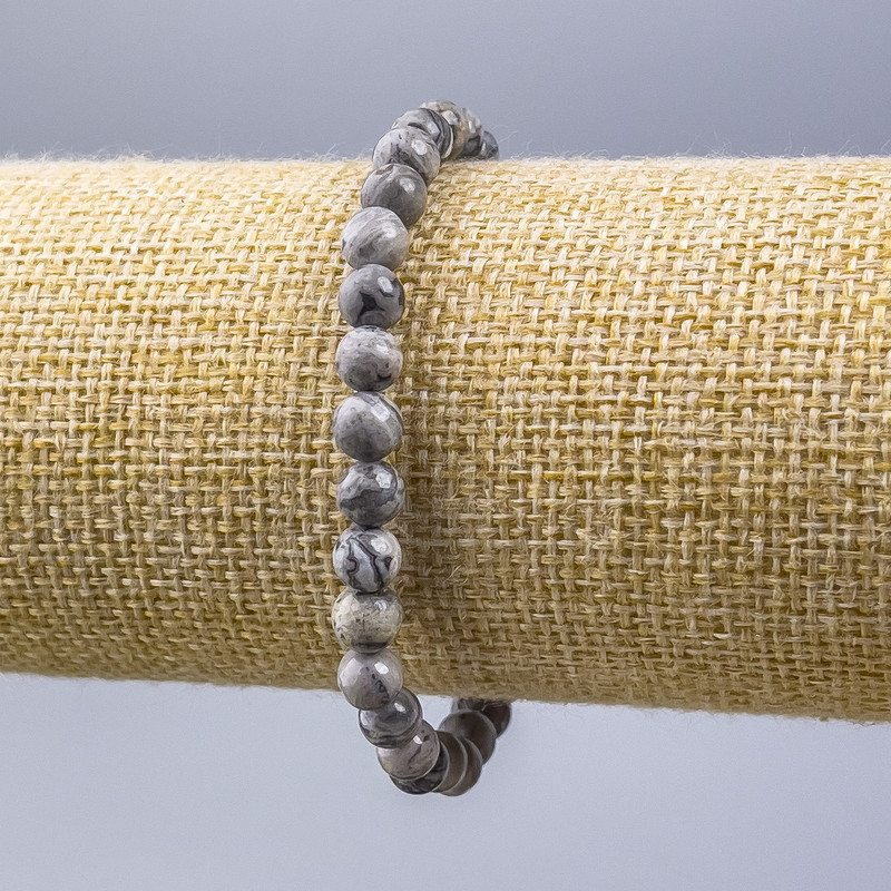Гривна от сива океанска яшма (изкуствен акрил) с гладко полирани мънисти, диаметър 6 мм, дължина 18 см (еластична основа)